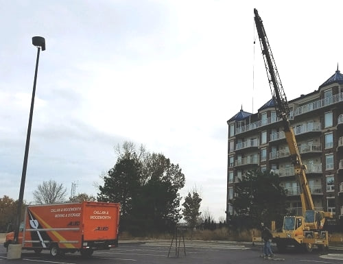 Callan and Woodworth Moving Into Condo With Crane
